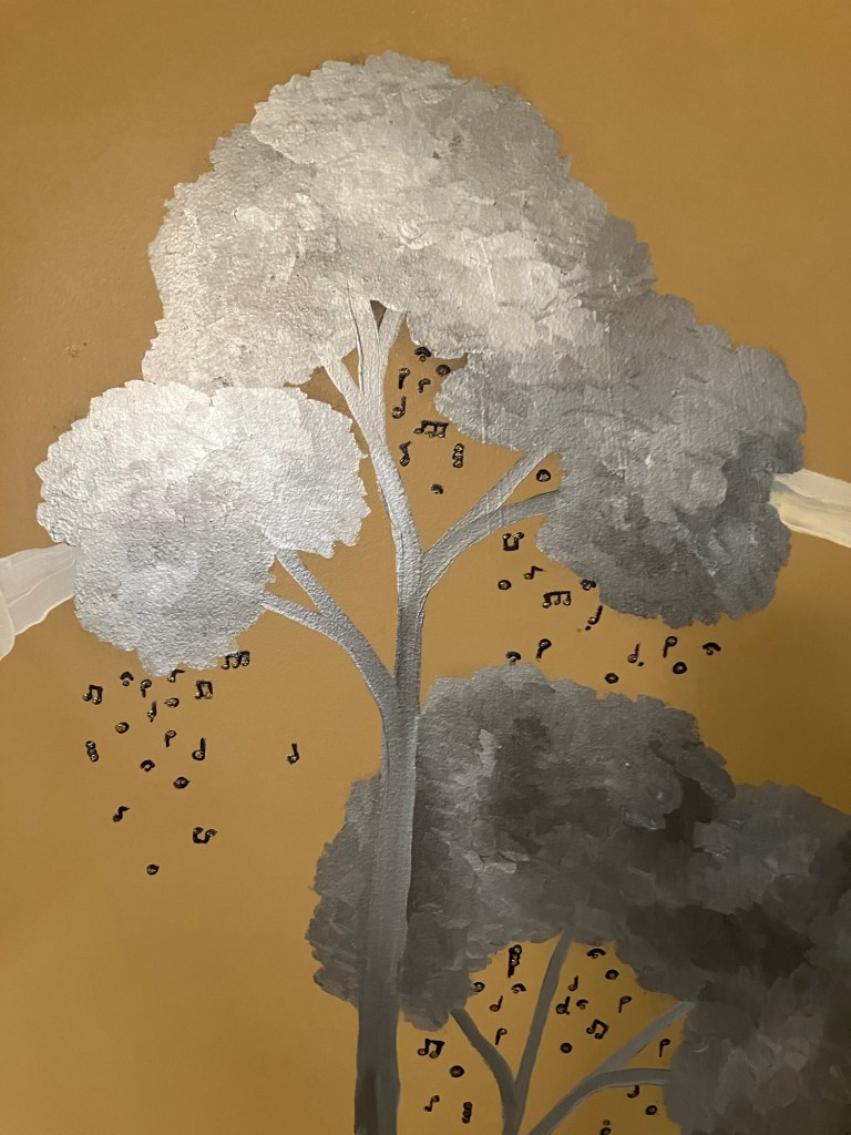 Tree with music notes falling from it art.